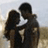Static 48x48 pixel icon showing two silhouetted figures in an embrace against a light background with blurred horizontal bands of color.