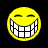 Yellow circular face with closed eyes and wide toothy grin on black background; red star-patterned background with pixelated text.