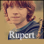 A pixelated portrait of a person with light brown curly hair wearing a blue striped shirt, with the name "Rupert" displayed below in white text.