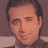 Static 48x48 pixel icon showing a close-up of a person's face with brown hair and neutral expression against dark background.