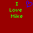 Red background with green text 'I Love Mike' and a blue heart symbol in pixelated style.