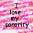 Pixelated text on a pink and white striped background with a gray section, stating 'I love my sorority', 'DNK rocks', 'I love my sisters', and 'only members are to use this icon'.