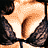 Pixelated image of a woman in a black lace bra with a choker necklace, showing chest and upper torso in multiple views.