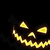 A pixelated yellow crescent shape with three triangular segments against a black background, resembling a stylized moon or abstract symbol.