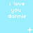 Light blue background with repeated white pixelated text "i love you dannie" in three , animated sparkles and dots appear at different positions across frames