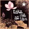 A static image of a pink lotus flower with a bud, brown leaves, and white text reading 'take me as i am' under a white star on a dark background.