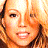 A 48x48 pixel buddy icon featuring a close-up of Mariah Carey's face on the left and green text reading "Original Icons .com" on a dark green background on the right, displayed as part of an animated contact sheet with two frames.