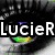 A pixelated eye with green and yellow highlights overlaid by white text reading "LucieR" on a black bar, next to a duck with colorful spots and text "Is a" on a white background.