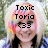 A pixelated image of a person with blonde hair and colorful streaks, wearing a blue and white checkered shirt, with text overlays changing across frames.