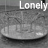 A grayscale animated icon shows a circular object with a small white rectangle on its right side, under the word 'Lonely' in white text.