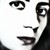 Black-and-white pixelated icon showing a stylized face with large eyes, a small nose, and a wide mouth, rendered in high-contrast monochrome with visible pixelation.
