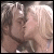 identical frames showing two people kissing, with text overlay reading 'Rali 4ever' in white font