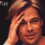 Pixelated static image of a person with light brown hair resting their hand on their forehead against a dark background.