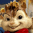 Pixelated cartoon chipmunk face with brown fur, black eyes, and red clothing against light green background.