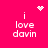 A bright pink background displays four identical text blocks reading "i love davin" with pixelated white dots forming a heart above the top-left block and a starburst pattern above the top-right block.