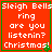Red square with green border displays white text 'Sleigh Bells ring are you listenin? Christmas' and small green tree icon.