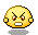 Pixelated circular character with angry expression, yellow and red color scheme, white teeth, orange eyes, small ears, gray shadow on light gray background.