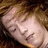 Pixelated image of a person with light brown hair on a red background, with yellow text reading "its note." and "from SING IT LOUD!!" in separate sections.