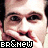 Pixelated close-up of a person's face with visible mouth and eyes, featuring red smears on the lips and chin, overlaid by black-and-white text reading "BR&NEW" at the bottom.
