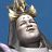 Pixelated static image of a figure with closed eyes, a crown, and long hair against a blue background.