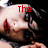 Pixelated image of a cartoon character with red eyes and black hair, featuring red text above the head that changes from 'The' to 'Distillers'.