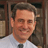 A pixelated image shows a smiling man in a light shirt and tie against a bookshelf background, with blue text reading "DRAFT RUSS" on the right and "FEINGOLD for PRESIDENT 2008" below.