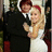 Pixelated image of a couple in wedding attire with red text stating 'Hah! Drake Bell and shley Tisda Are Married!'
