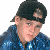 A 50x50 pixel animated buddy icon featuring a person in a blue checkered shirt and black cap on the left, with green text "Original Icons .com" on a dark green background to the right.