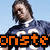 Pixelated image of a person with shoulder-length brown hair wearing a dark blue shirt with white accents against a light blue background, overlaid with orange and black text.
