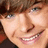 A pixelated image divided into four quadrants with a person's face in the top-left, blue backgrounds in top-right and bottom-left, and gray background in bottom-right.