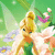 Pixelated fairy with blonde hair in a bun, green dress, and translucent wings, set against a green background with flowers and light beams.