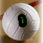 A circular white volleyball with red accents on a beige background, displaying changing text overlays.