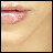 A close-up of lips with glossy pink lipstick, showing subtle animation changes across four