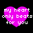 Four identical pink heart-shaped icons with white text reading 'my heart only beats for you' arranged in a on a black background
