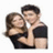 Pixelated image of two people embracing, with text identifying them as Laura Osnes and Max Crumm as Sandy and Danny from Grease in Broadway.