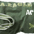 Green fabric background with repeated 'EAGLE' text, white spiral lines, and small green star shapes, featuring changing white text overlays.