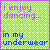 A static pixel art image with a green checkered background, purple border, and text reading 'i enjoy dancing...' in purple followed by 'in my underwear' in blue.