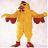 Pixelated figure in yellow jumpsuit with arms outstretched, brown shoes, and dark hair against light background.