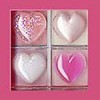 Four heart-shaped icons arranged in a 2x2 grid, each with distinct textures and colors against a pink background.