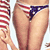 A 2x2 contact sheet of four animated frames showing a person in an American flag–patterned bikini top and bottom, with visible body parts including legs, torso, arms, and face across different poses.