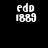 Static pixel art displays fragmented white text on black background with a gray rectangle in bottom-right corner.