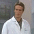 A split-frame contact sheet showing a pixelated image of a person in a white jacket on the left and green text reading "Original Icons .com" on the right against a dark background.