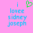 Pixelated text and symbols on a pink background with a green heart symbol above the text.