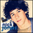 Pixelated image of a person with dark curly hair wearing a dark blue shirt, with blue text partially visible on the left side.