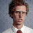 A pixelated composite image with a person in formal attire on the left and text blocks on the right.
