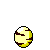 Pixelated yellow spheres with brown stripes rotate clockwise in a , while a static Pikachu figure stands to the right