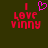 Pixelated text 'I Love Vinny' with a pink heart symbol above 'I' on a dark green background, shown in two states where the heart is present in the first state and absent in the second.