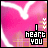 A four- of pixelated pink heart-shaped icons with white outlines and text reading "I HEART YOU" in blocky black-and-white lettering, each showing a different arrangement of small white hearts
