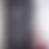 A static image with vertical gradient stripes transitioning from dark gray to light gray and faint red tones on the right edge.