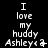 A black background displays three vertical of white pixelated text reading "I love my huddy Ashley" with varying symbols at the end, each showing a different symbol in sequence